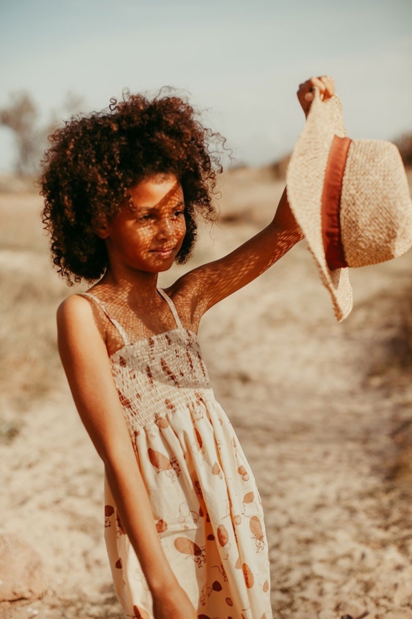 Smocked dress in beige