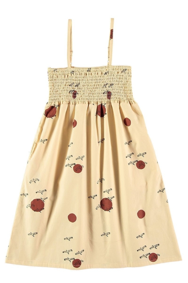 Smocked dress in beige