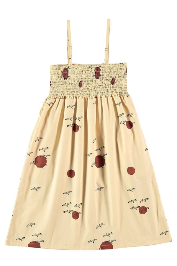 Smocked dress in beige