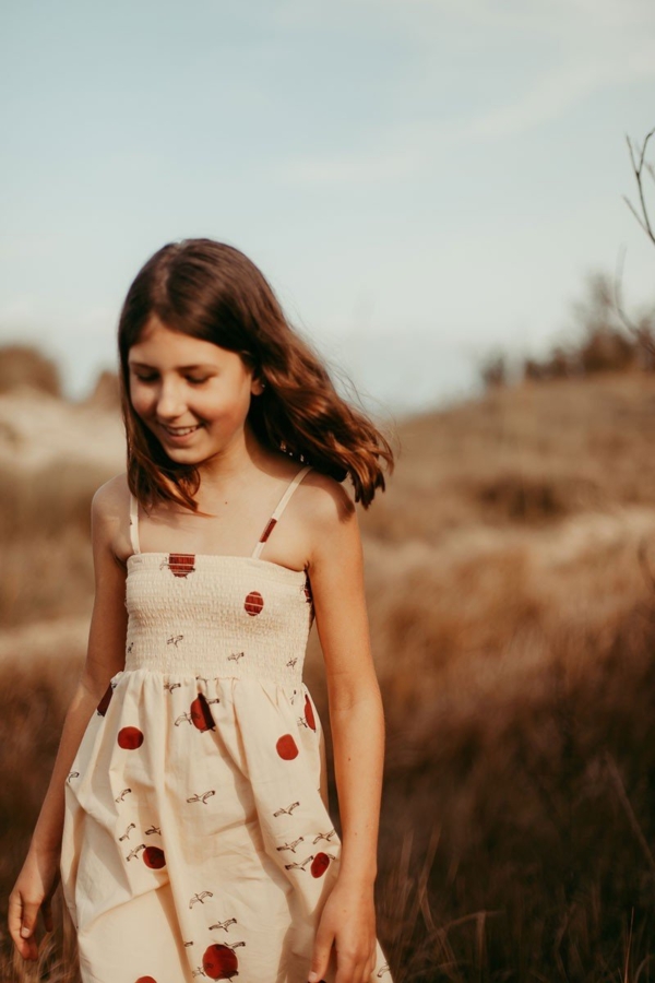 Smocked dress in beige