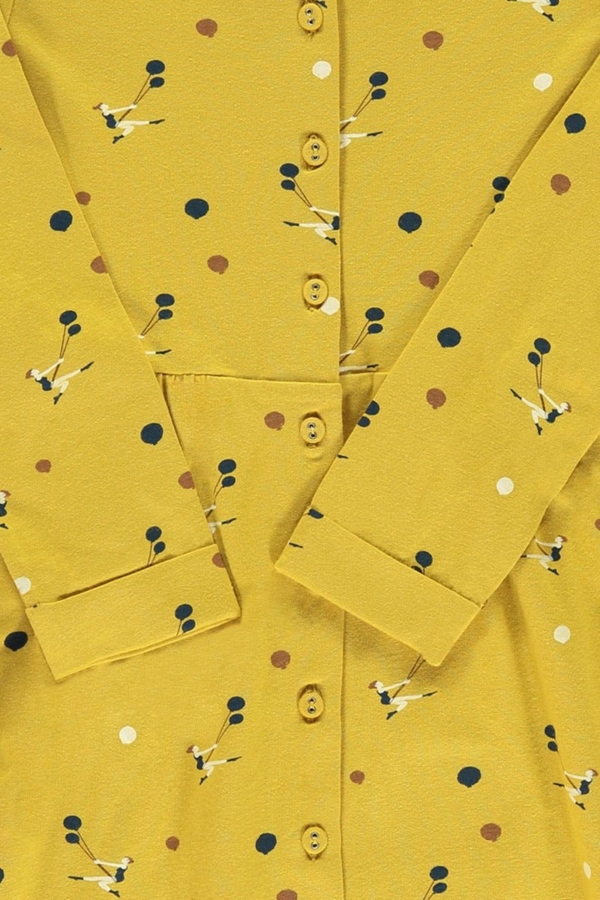 Vestido botones mostaza estampado trapecistas