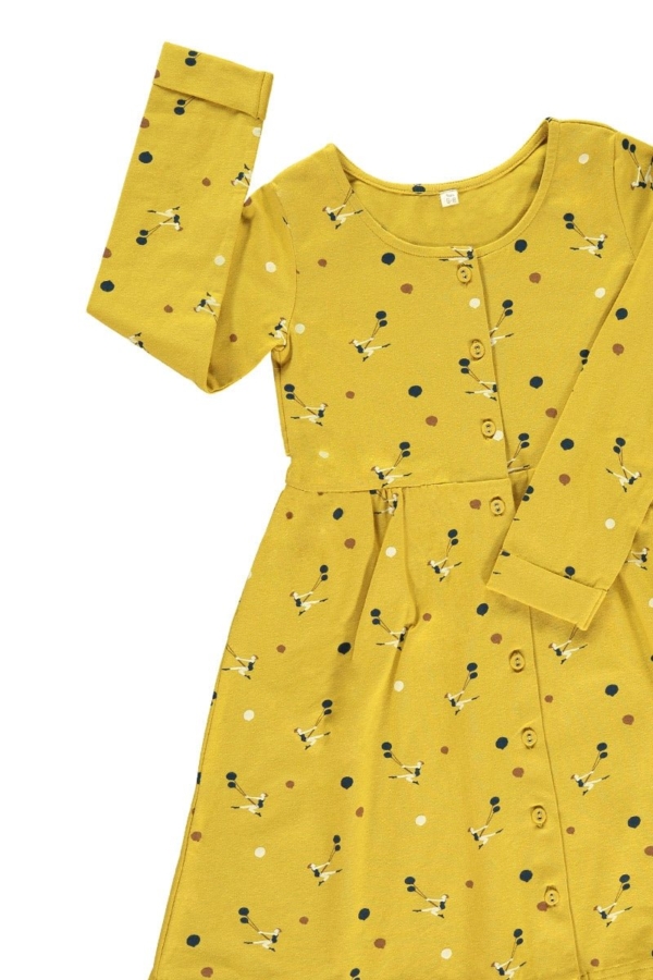 Vestido botones mostaza estampado trapecistas