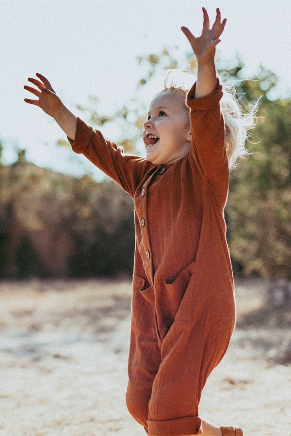 Surya unisex jumpsuit in terracotta