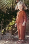 Surya unisex jumpsuit in terracotta