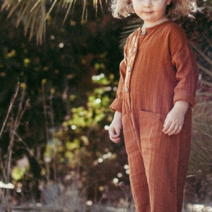 Surya unisex jumpsuit in terracotta