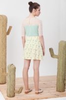 Falda lazo Ingrid color amarillo con estampado de ciervos.