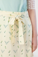 Falda lazo Ingrid color amarillo con estampado de ciervos.
