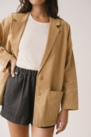 Americana de sarga mostaza