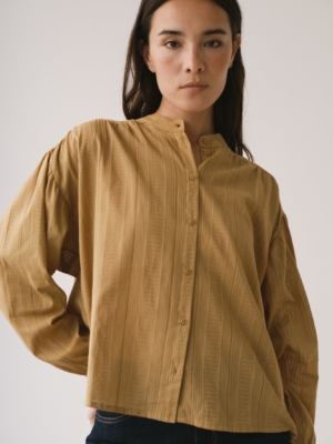 Blusa oversized mostaza